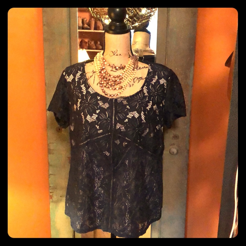 Navy top with cream liner
